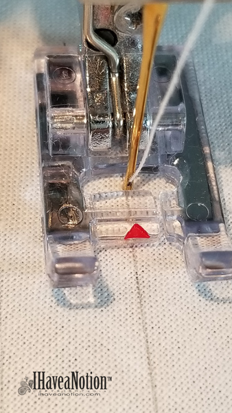 Stitching the squares to make half square triangle blocks